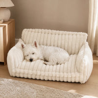 Chien endormi dans un canapé peluche gris foncé confortable | KALMO