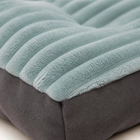 Détail du polyester texturé du panier chien vert forêt